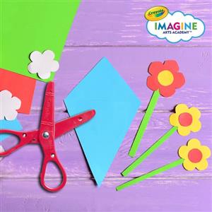 paper flowers next to scissors and the Crayola Imagine Arts Academy Logo