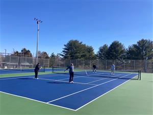 people playing pickleball at the Simsbury Farms Courts