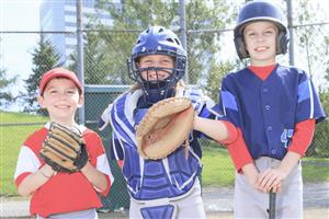 Young baseball player, girl catcher, boy with bat